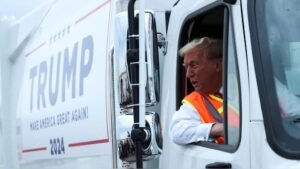 Why did Donald Trump dress as a garbage truck operator in Wisconsin?