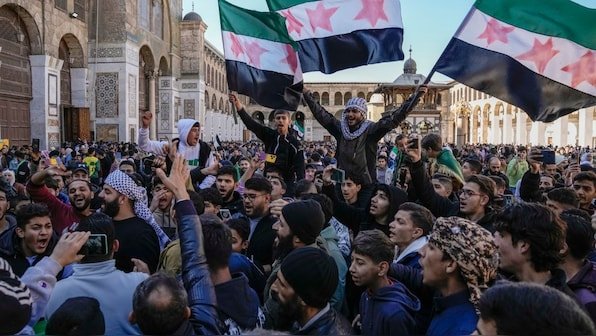 Syrian police ambushed by pro-Assad forces, 14 killed